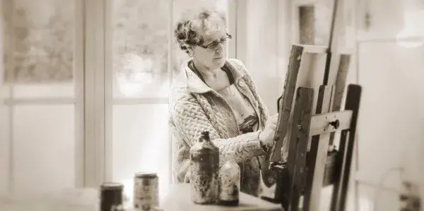 Artist painting outdoors in Muskoka